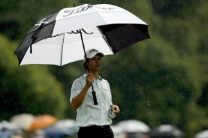 Adam Scott í móti í Singapore 2006 í úrhellisrigningu