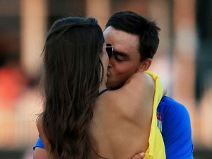 Nautnafullur koss Alexis Randock og Rickie Fowler eftir sigur Rickie á The Players vakti athygli