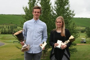 Emil Þór Ragnarsson og Ingunn Einarsdóttir, klúbbmeistarar GKG 2014. Mynd: GKG